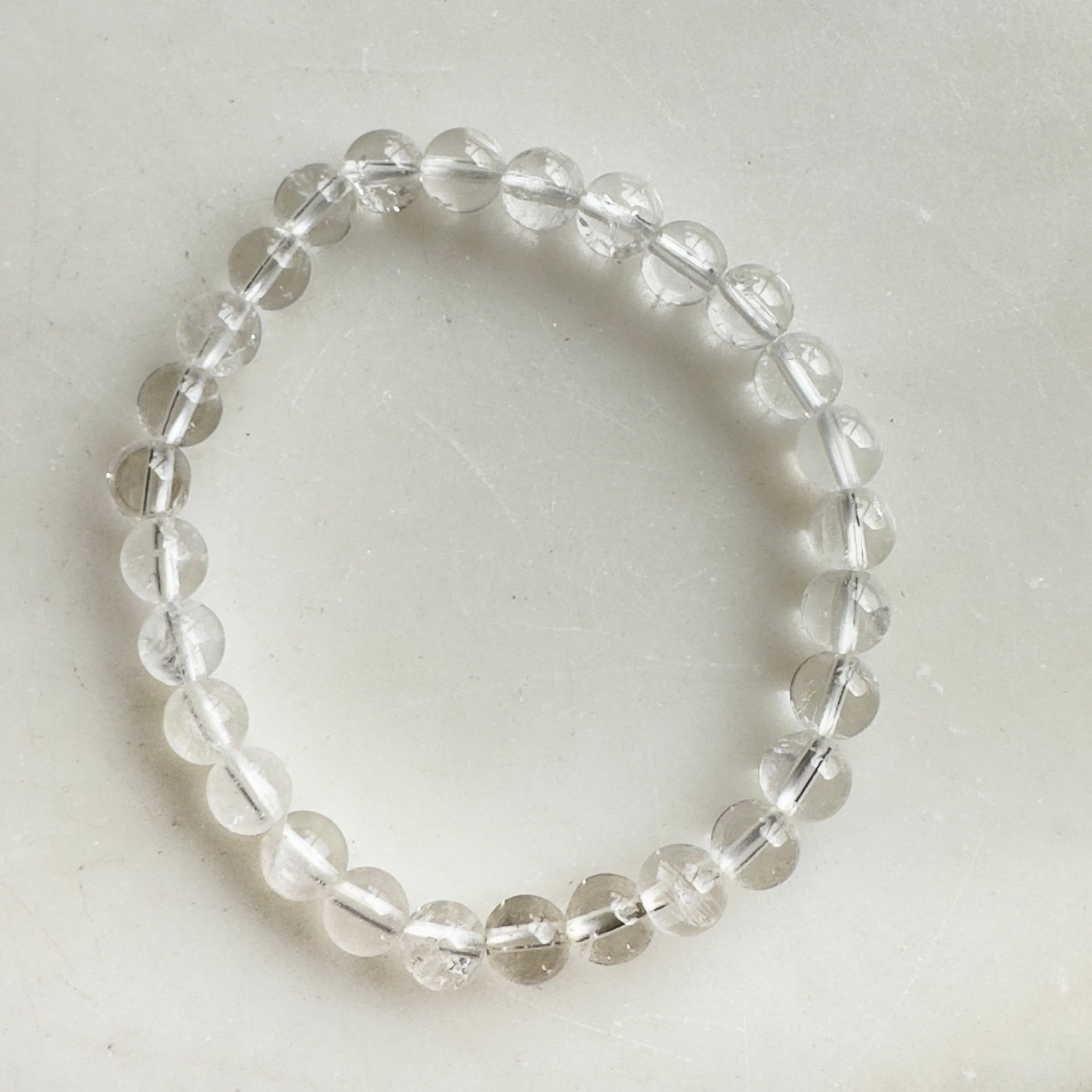 Bjergkrystal armbånd 6mm - 5stk.